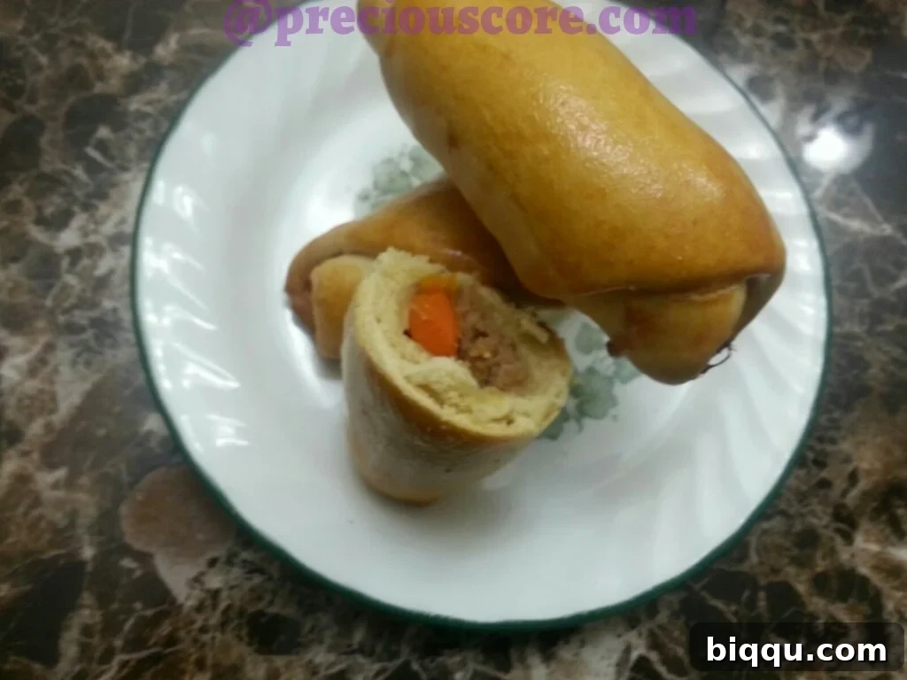 Platter of freshly baked chicken rolls arranged beautifully