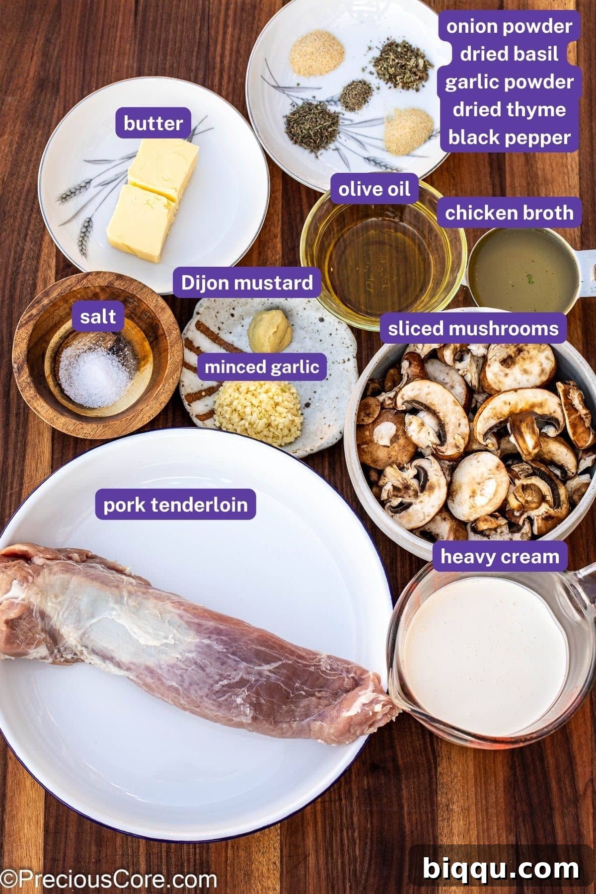 Arrangement of key ingredients for creamy mushroom pork tenderloin, including pork, mushrooms, cream, and herbs, clearly labeled.