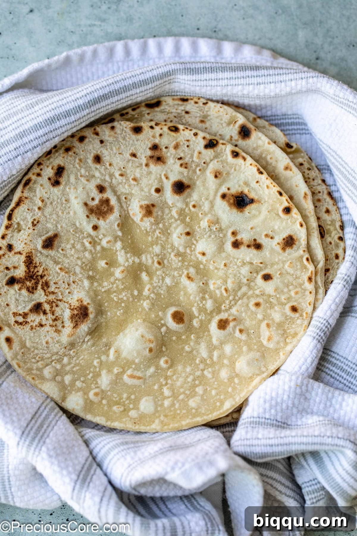 Golden Shawarma Wraps 2 Fresh shawarma bread on linen.