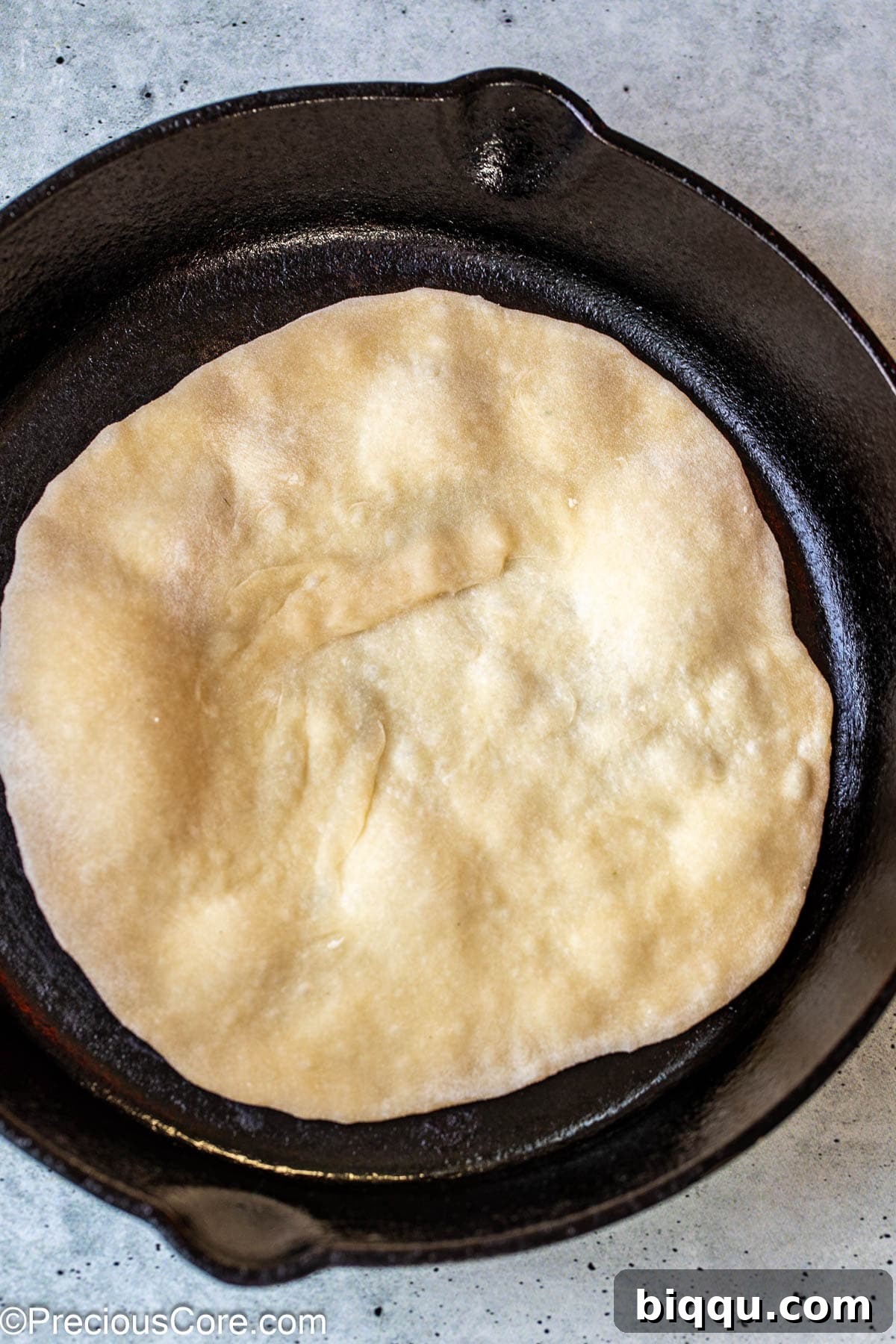 Golden Shawarma Wraps 10 Shawarma bread cooking in a skillet.