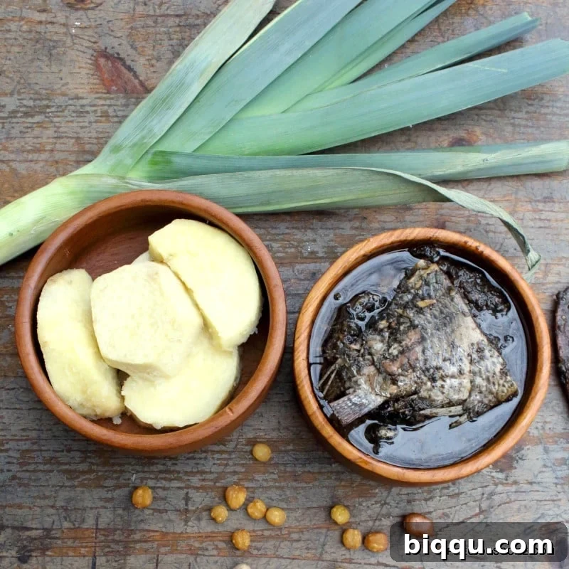 Close-up of freshly prepared Mbongo Tchobi, a spicy black fish stew