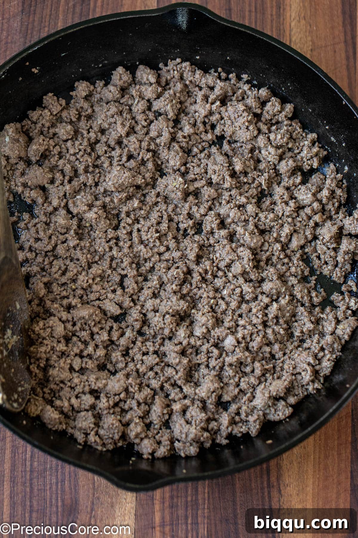Savory Beef Spring Rolls 7 Cooked ground beef in a skillet with spices.