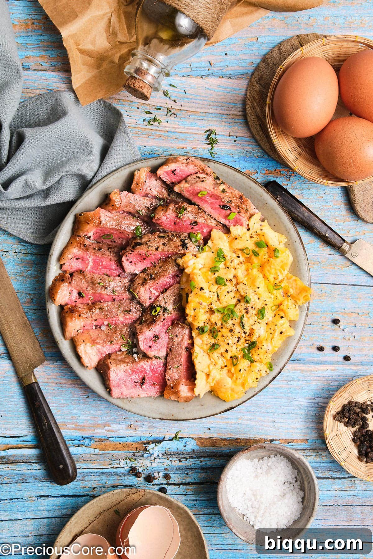 A beautifully plated homemade steak and eggs breakfast, ready to be served and enjoyed.