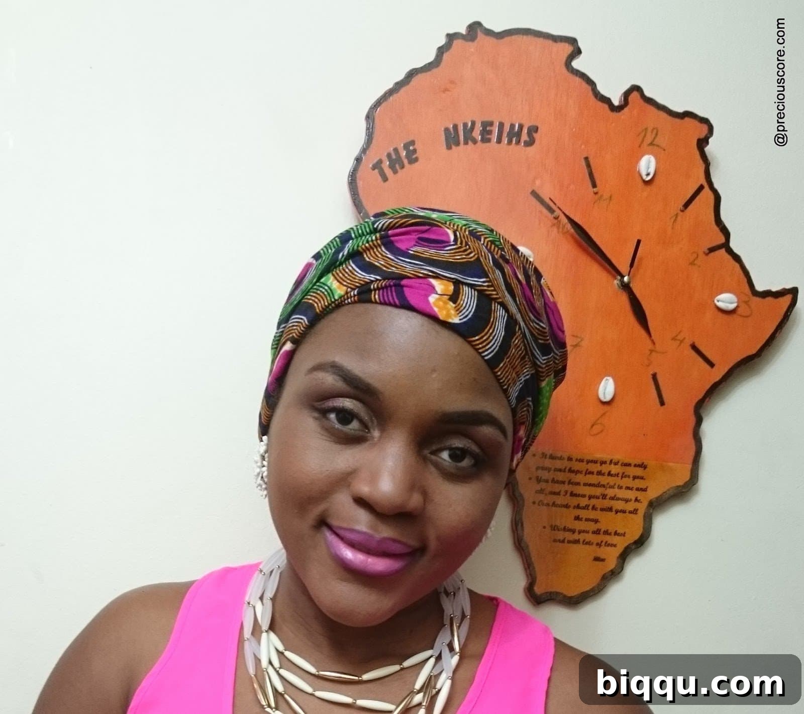 A unique African-shaped clock, a cherished family gift, prominently displayed as part of home decor.