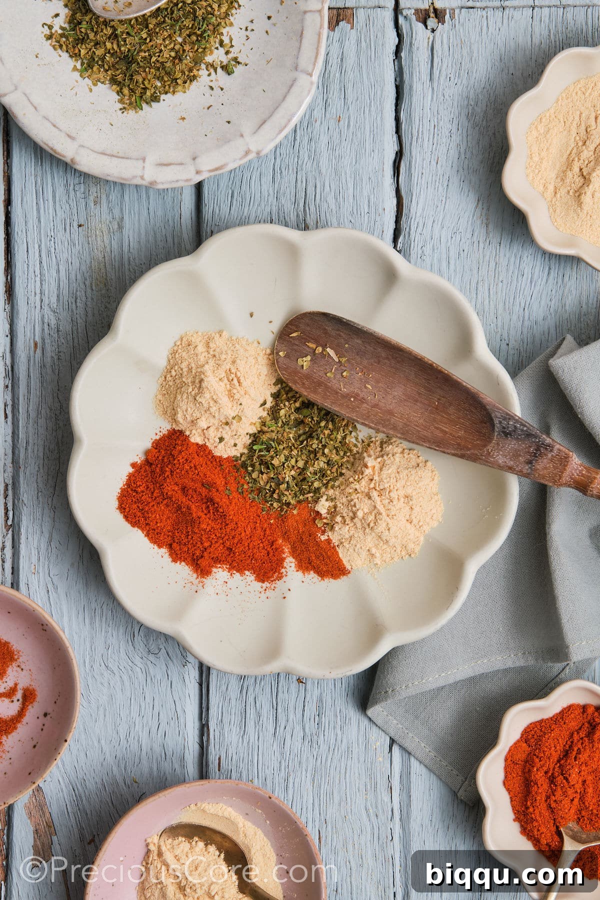 5 different seasonings on a plate.