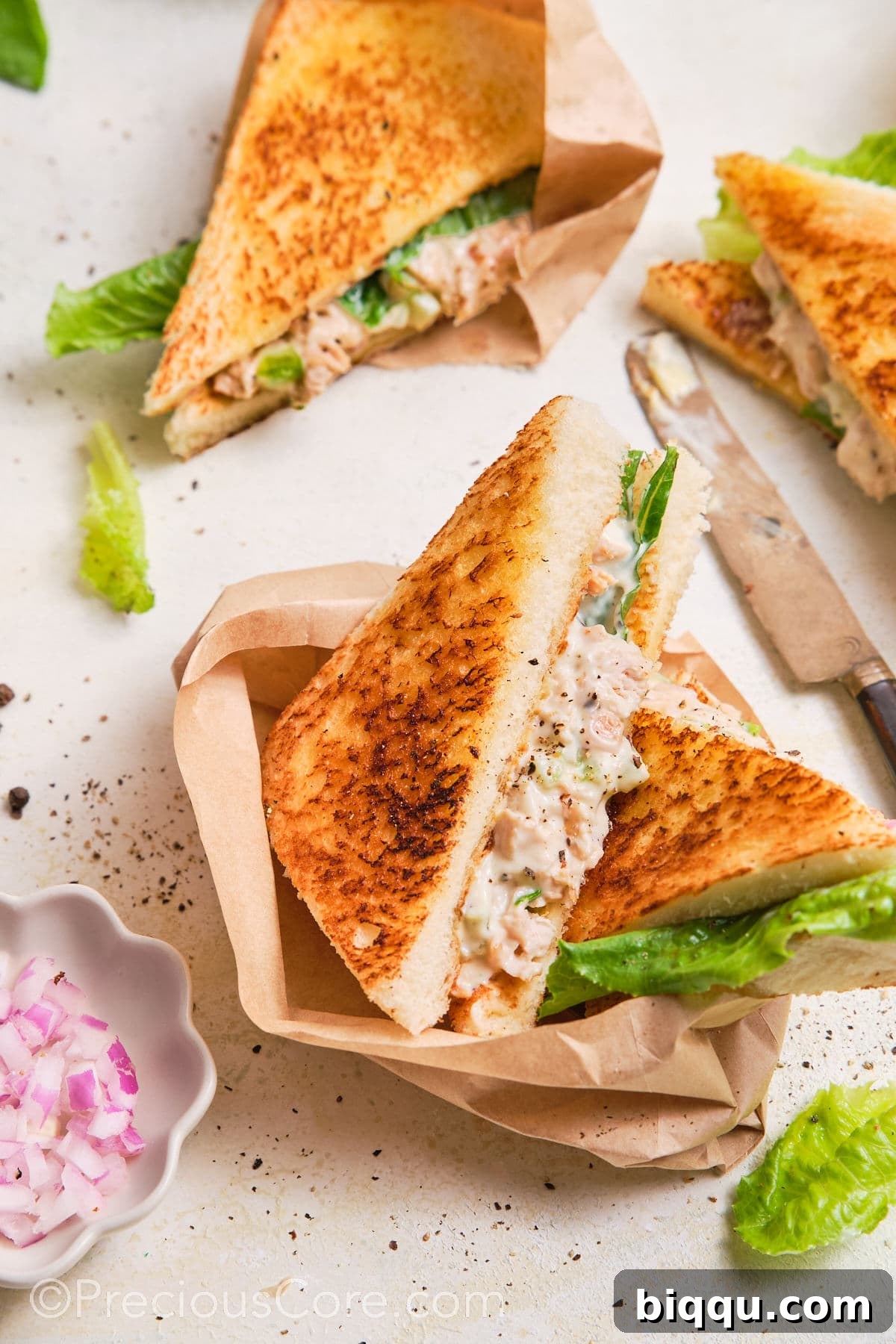 Chicken Mayonnaise Sandwiches cut into triangles.