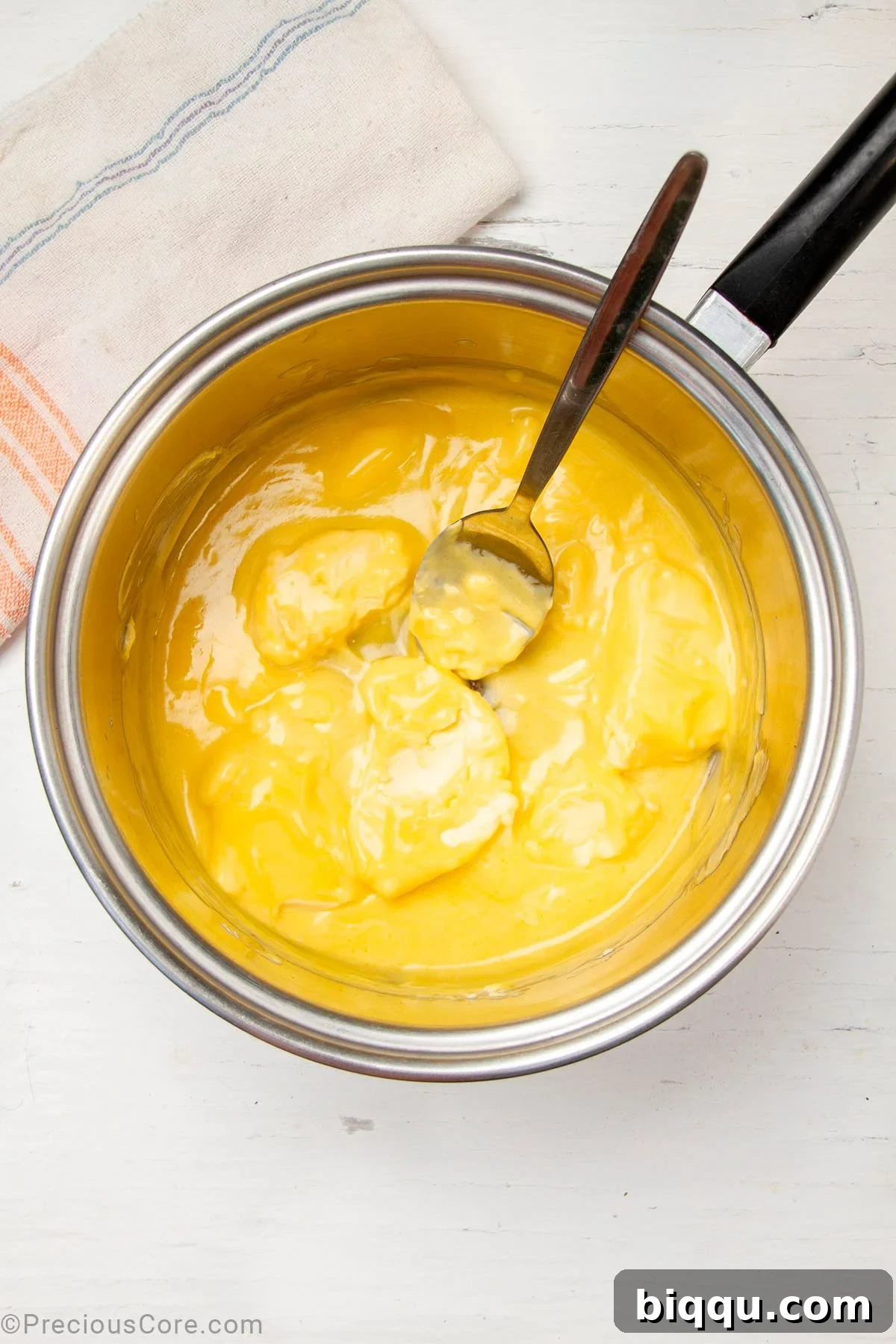 Butter melting gracefully in a saucepan, ready for the next step of making béchamel sauce.