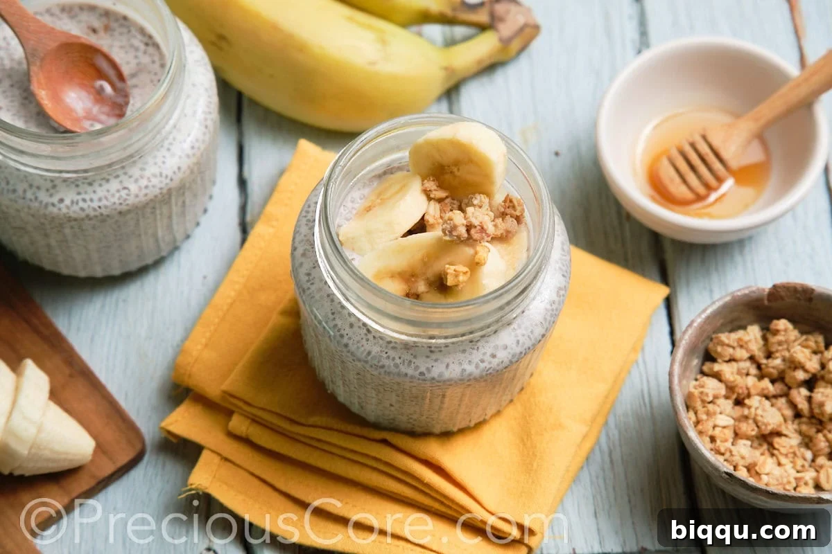 A single glass jar of banana chia seed pudding, close-up, showing its creamy texture.
