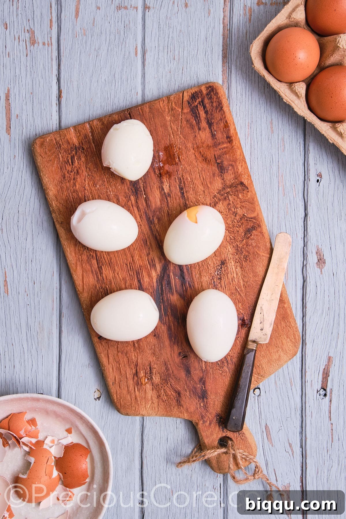 A selection of perfectly peeled hard-boiled eggs, smooth and ready for the next step.