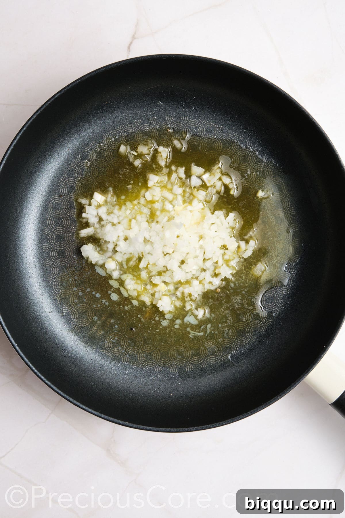 Onions frying in oil.