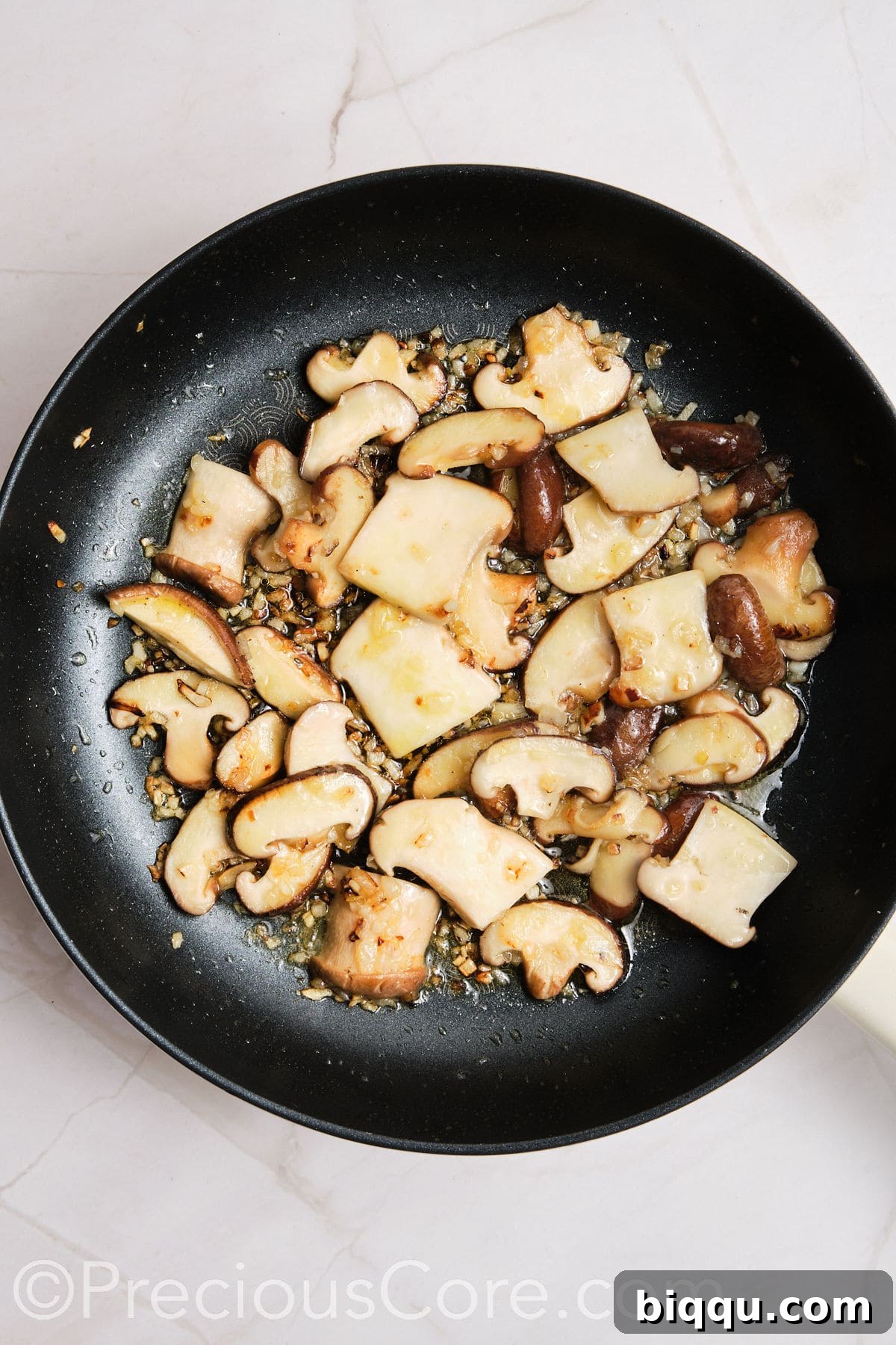 Browned mushrooms in a pan.