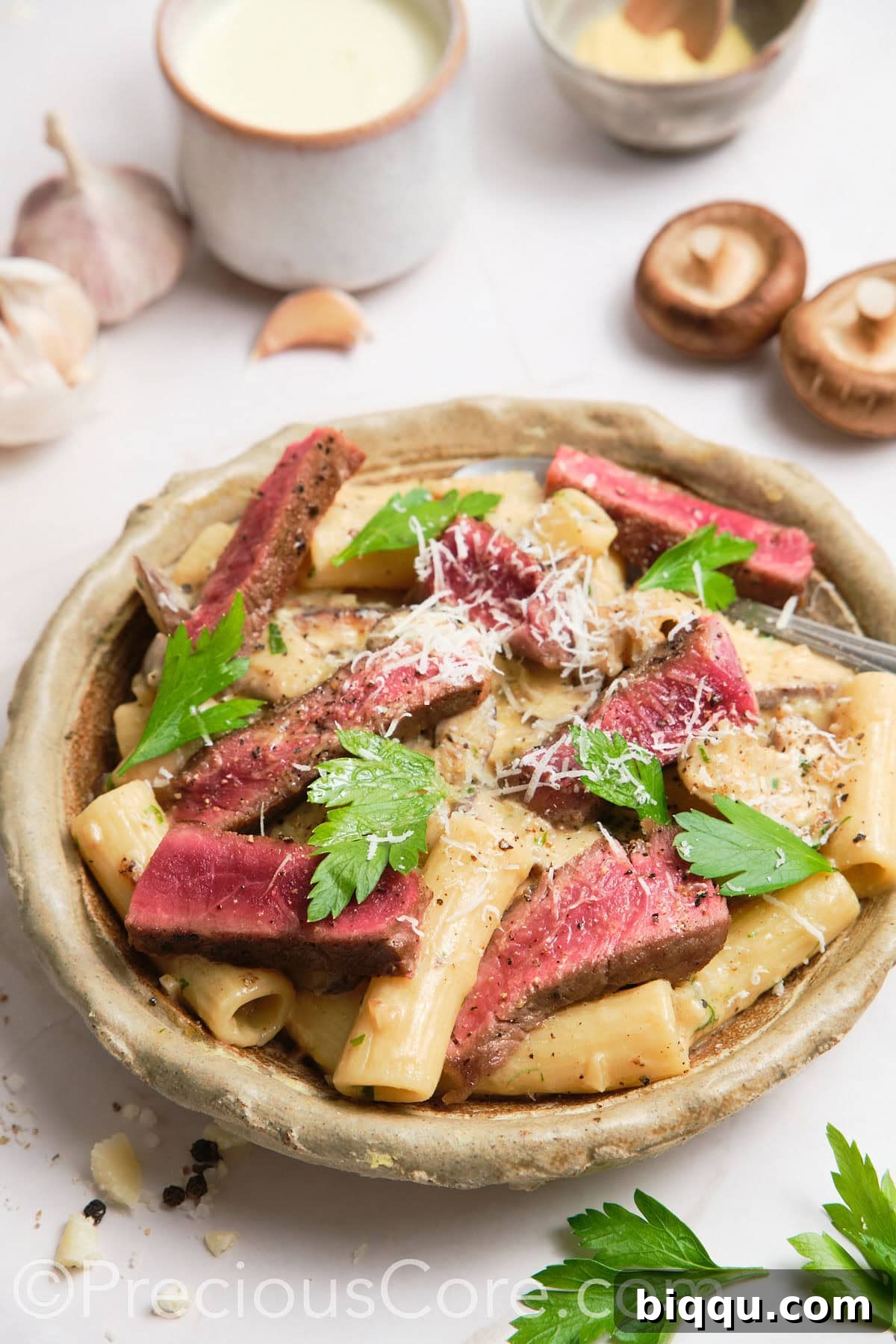 Steak pasta in a bowl.