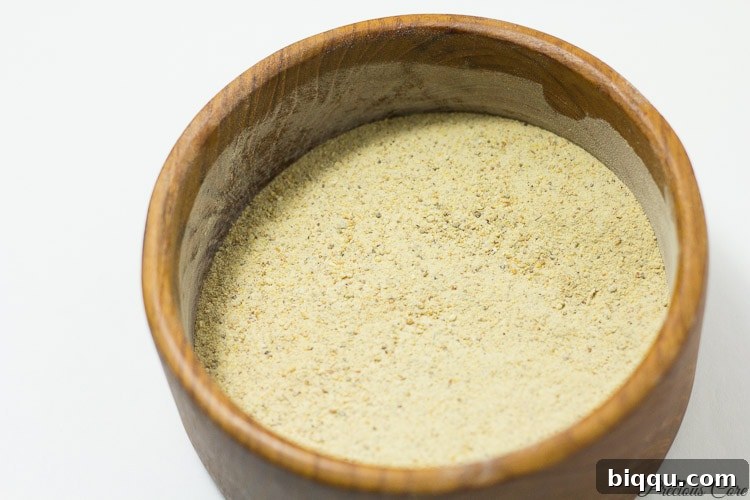 Homemade plantain flour in a wooden bowl.