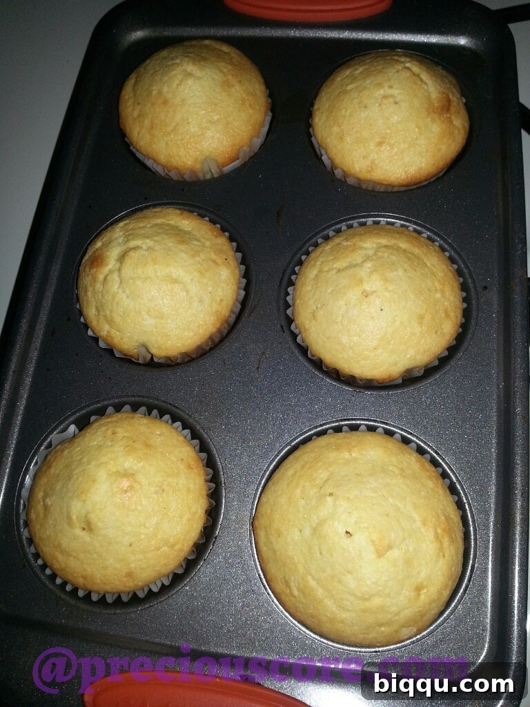 A basket of freshly baked golden corn muffins