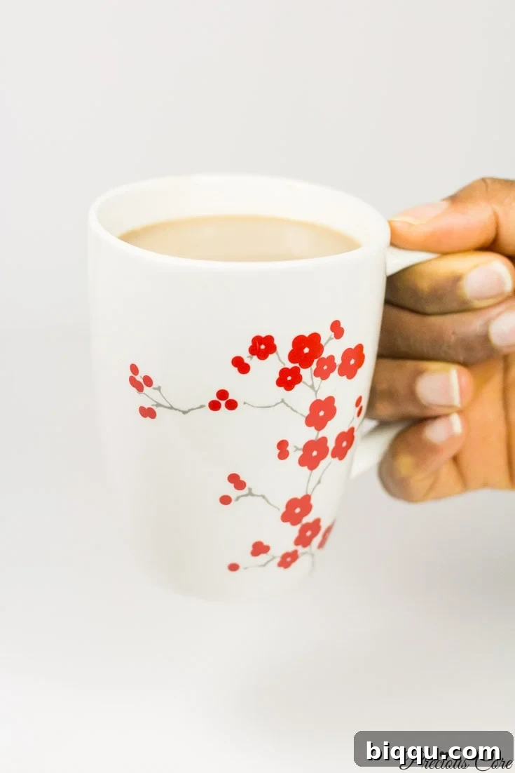 A steaming mug of delicious, healthy, and dairy-free coconut hot chocolate, ready to enjoy.