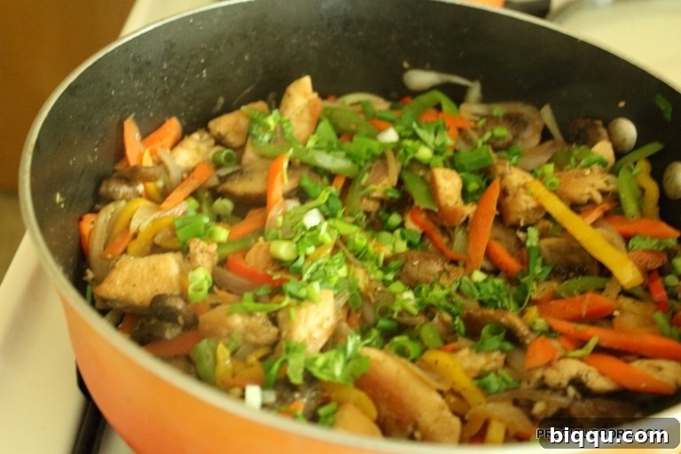 Garnishing Stir Fry with Green Onions