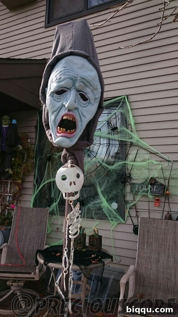 A close-up of Halloween decor, possibly involving pumpkins or skeletons.