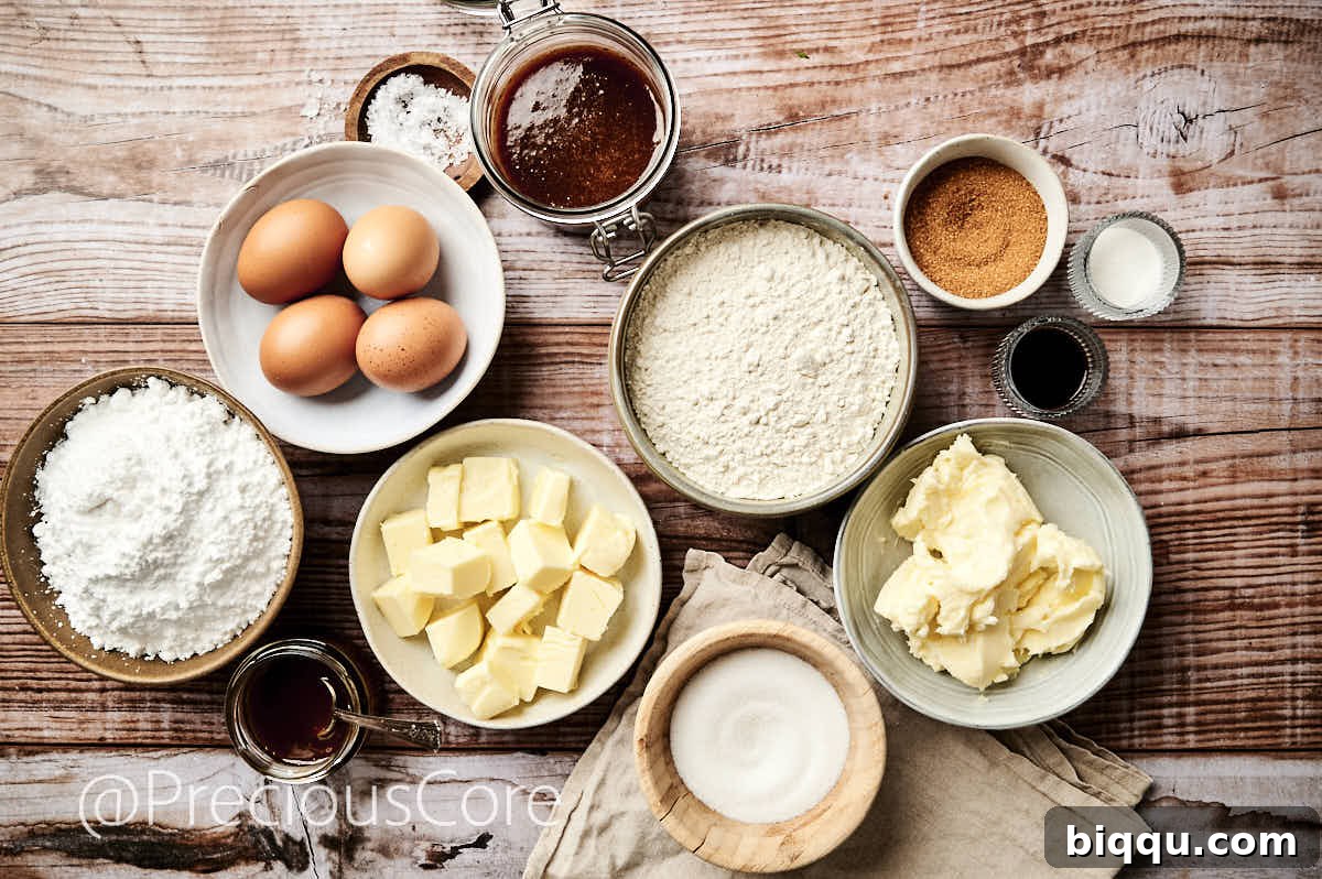A flat lay of all the fresh, high-quality ingredients needed to bake a delicious Salted Caramel Cake, arranged neatly on a kitchen counter.