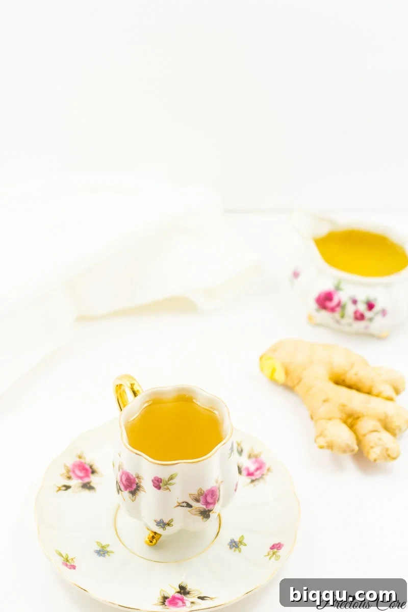 Finished ginger tea poured into a mug, ready to be served.