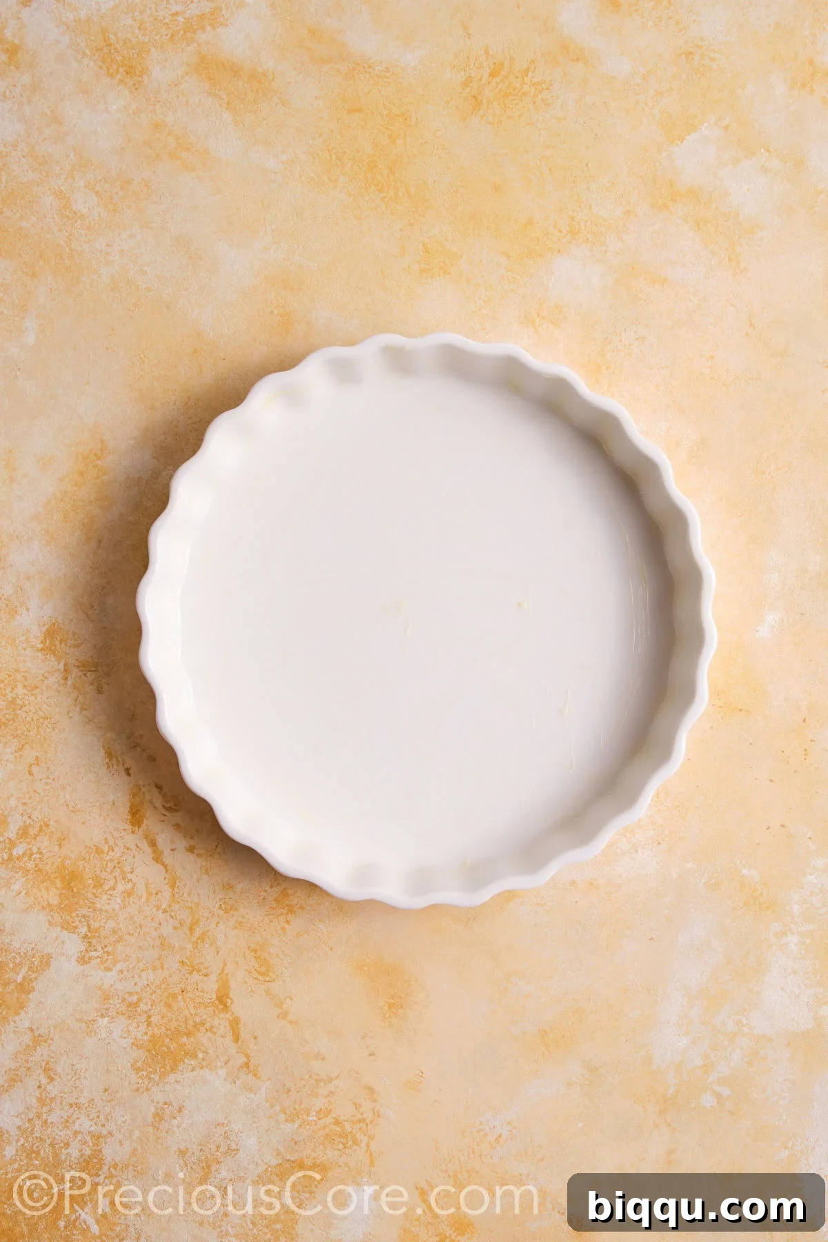 A greased pie dish.