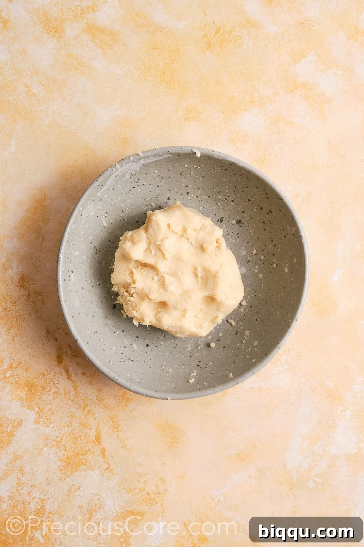 Pie crust dough coming together.