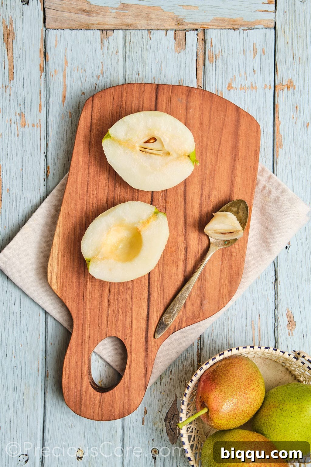 Fresh pears, peeled and cored.