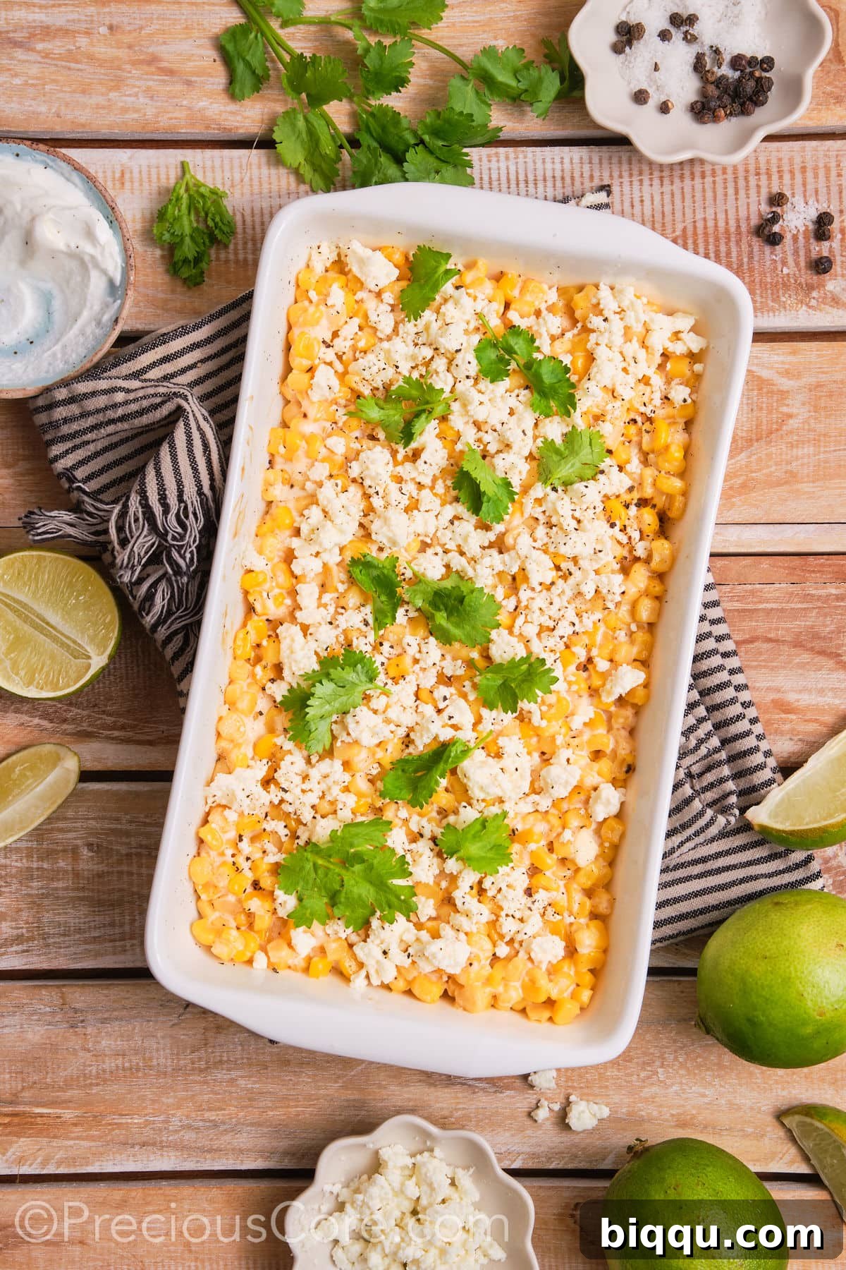 Finished street corn casserole, garnished with fresh cilantro and ready to be served.