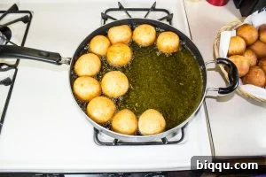 Cameroonian Gateau frying in hot oil