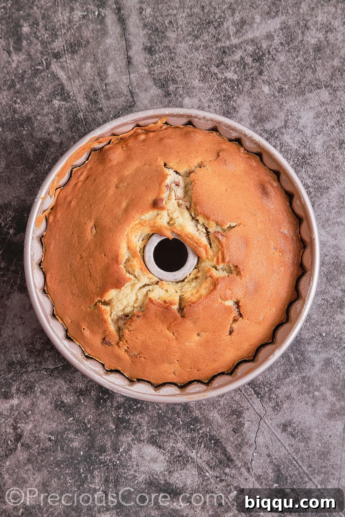 The Bundt pan with the Butter Pecan Pound Cake baking in a hot oven.