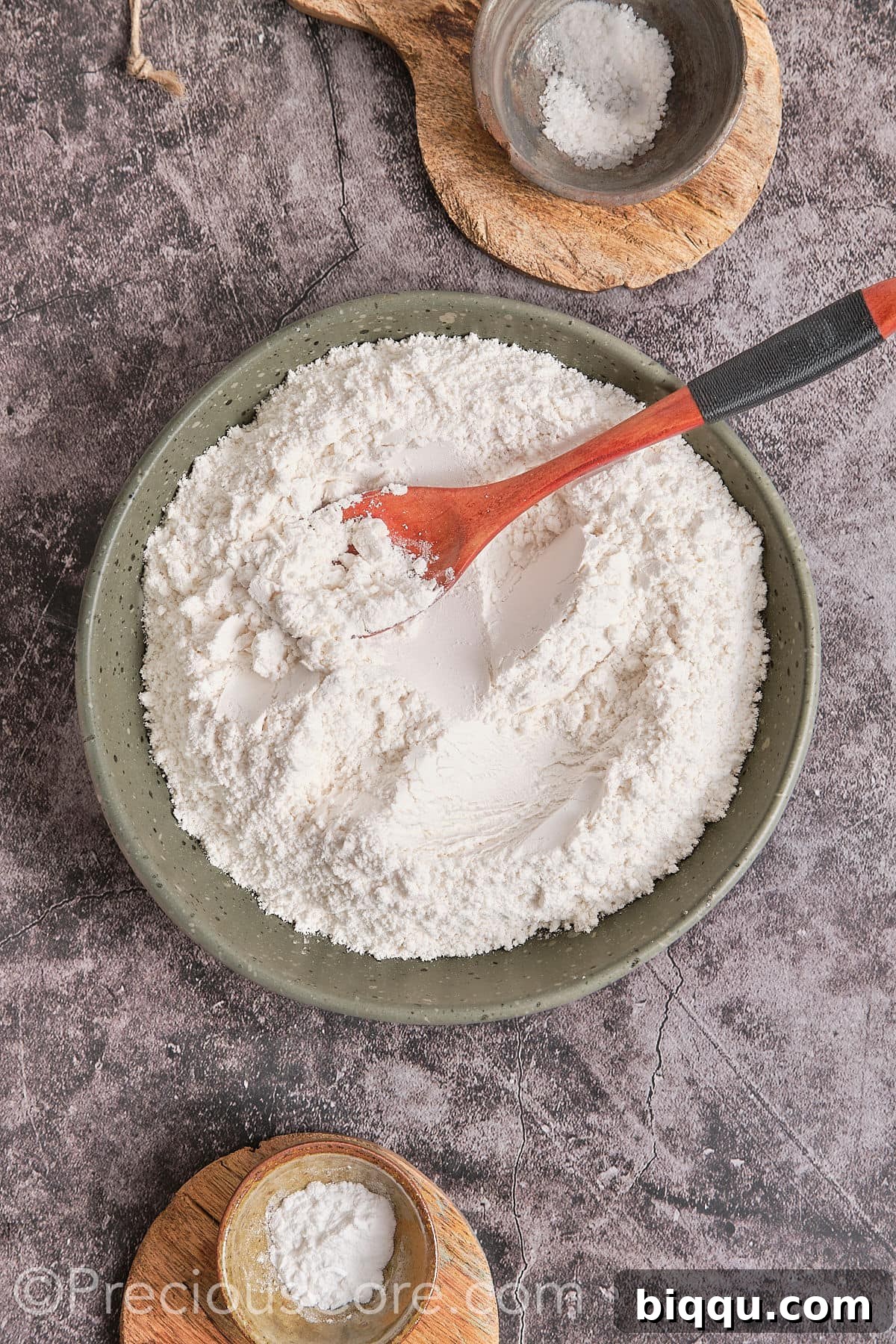 Flour, baking powder, and salt measured and mixed in a separate bowl.