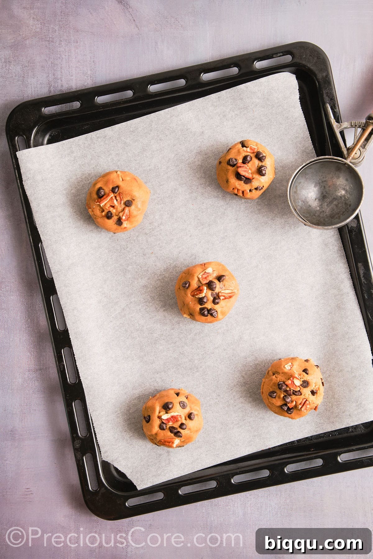 Brown Butter Pecan Bliss Cookies 14 Cookie dough scooped onto a prepared baking sheet.