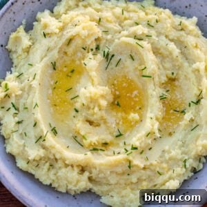 Bowl of mashed white sweet potatoes.
