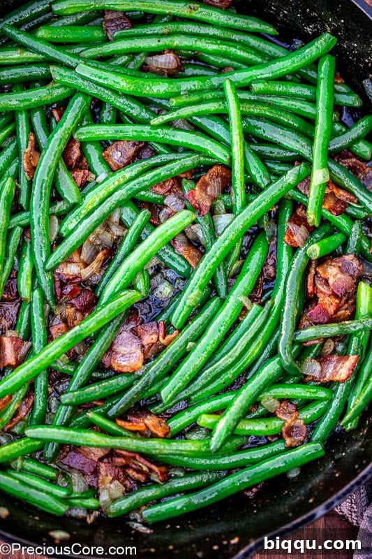 Pan of green beans with bacon.