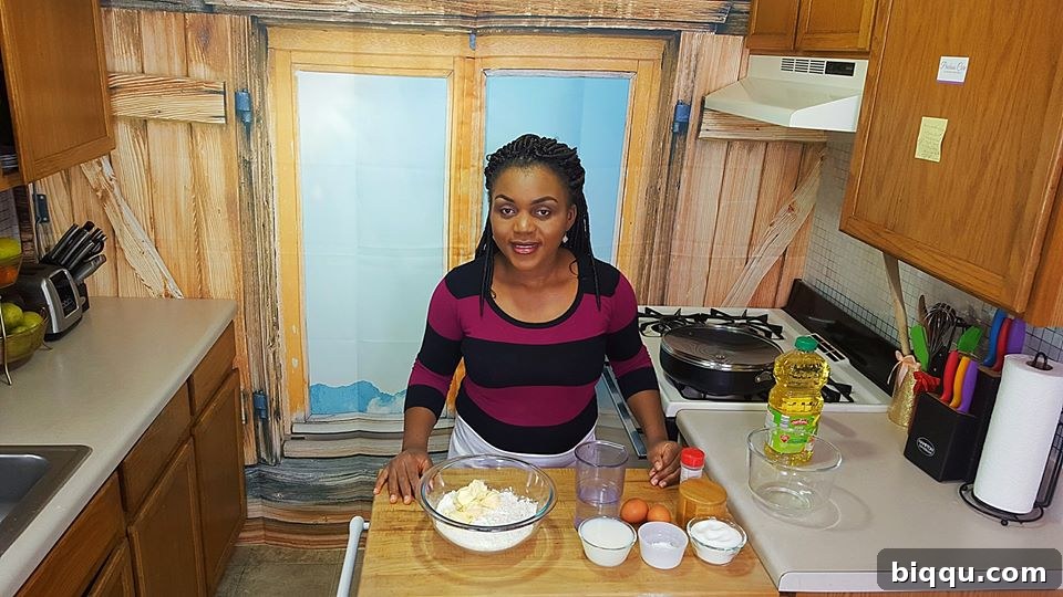 Precious in the kitchen setting up new video equipment