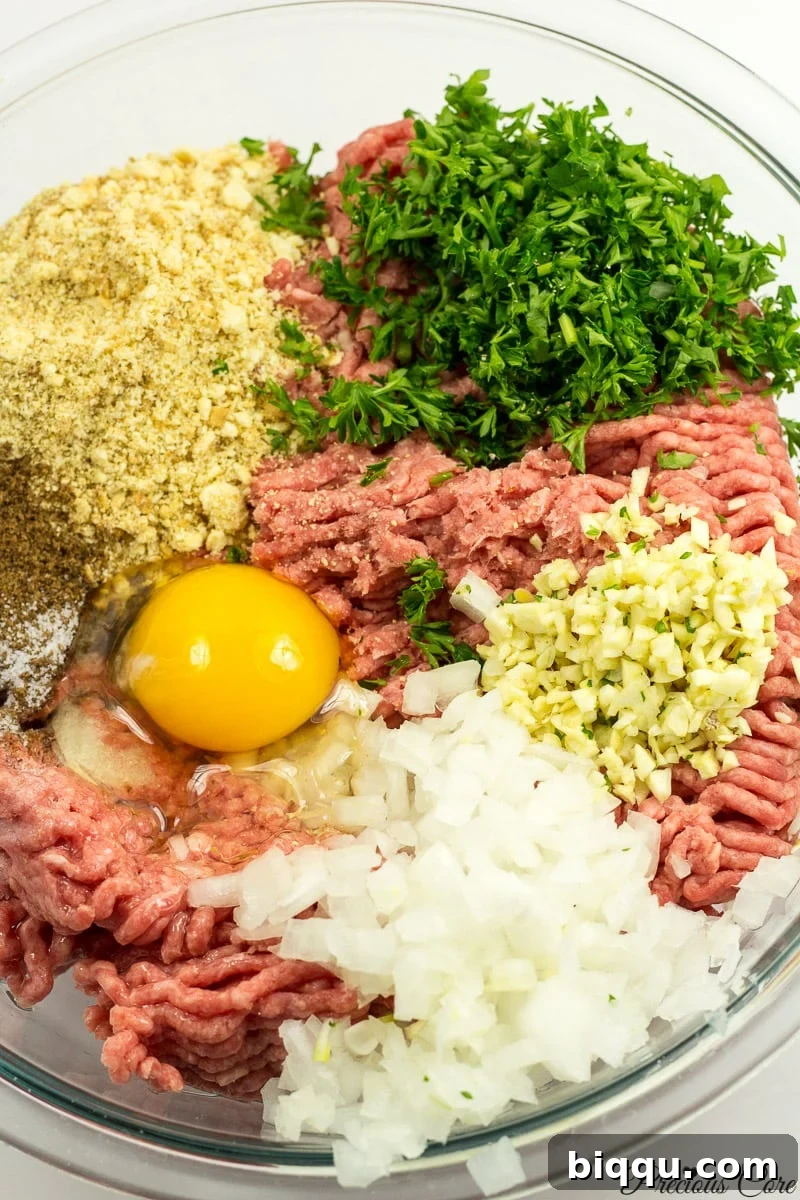 Ingredients for West African Meatballs in a large bowl
