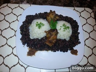 Plated Cameroonian Rice and Beans with Garnishes