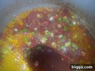 Adding Spices and Seasoning Cubes