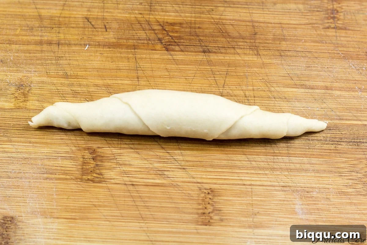 The finished technique of rolling Cameroonian fish rolls before frying