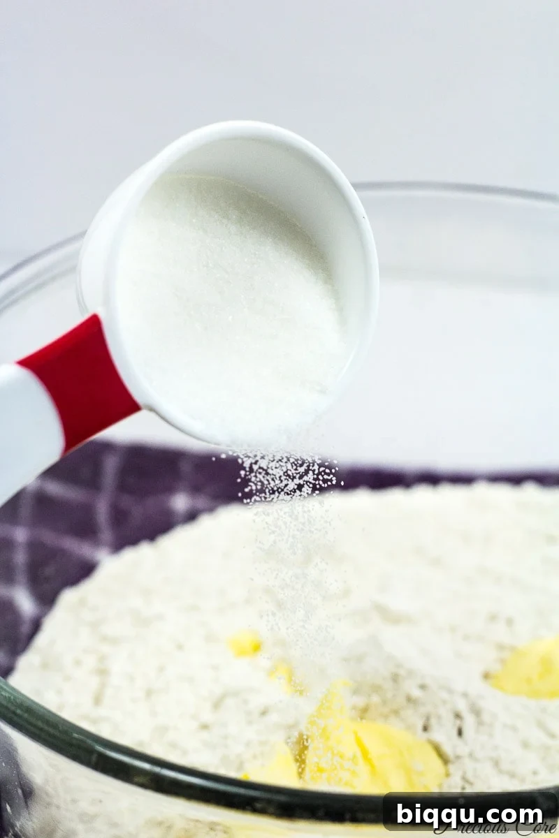 Incorporating sugar into the dough mixture for perfectly balanced crispy fish rolls