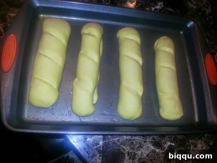 Dough pieces after rising, significantly increased in volume.
