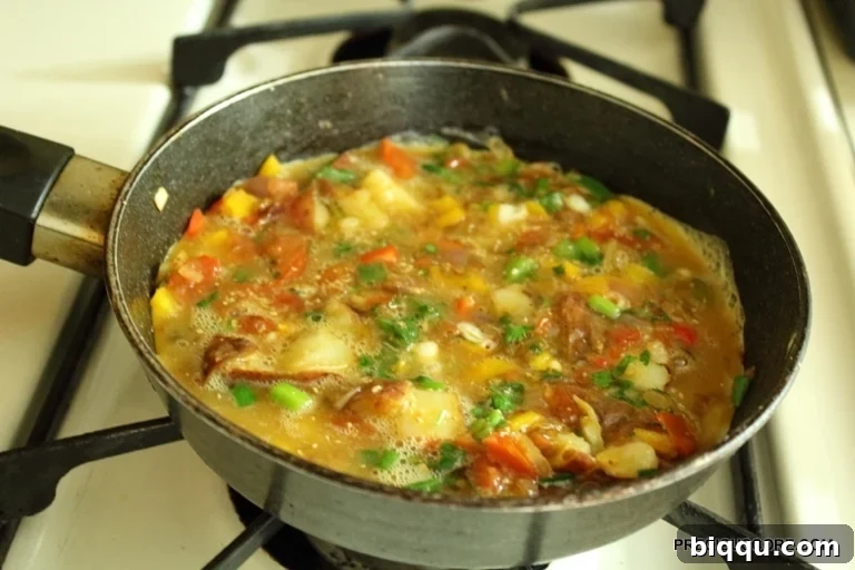 Egg Mixture Poured Over Vegetables