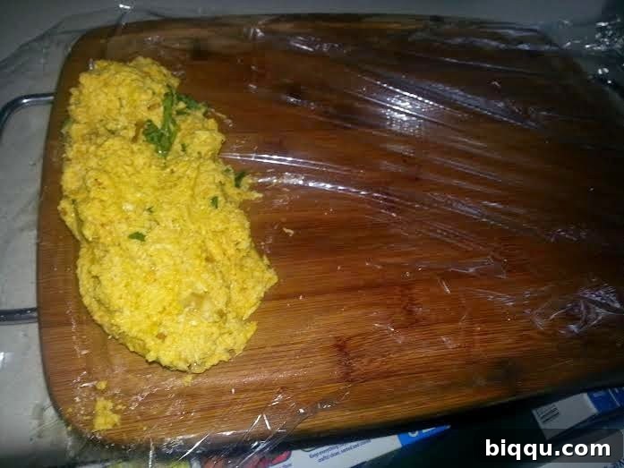 Preparing the wraps with banana leaves or foil.