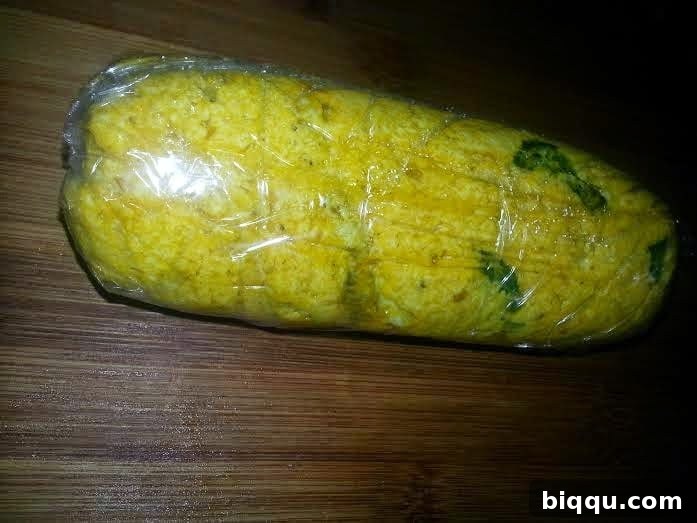 Wrapping individual portions of Kwacoco paste.