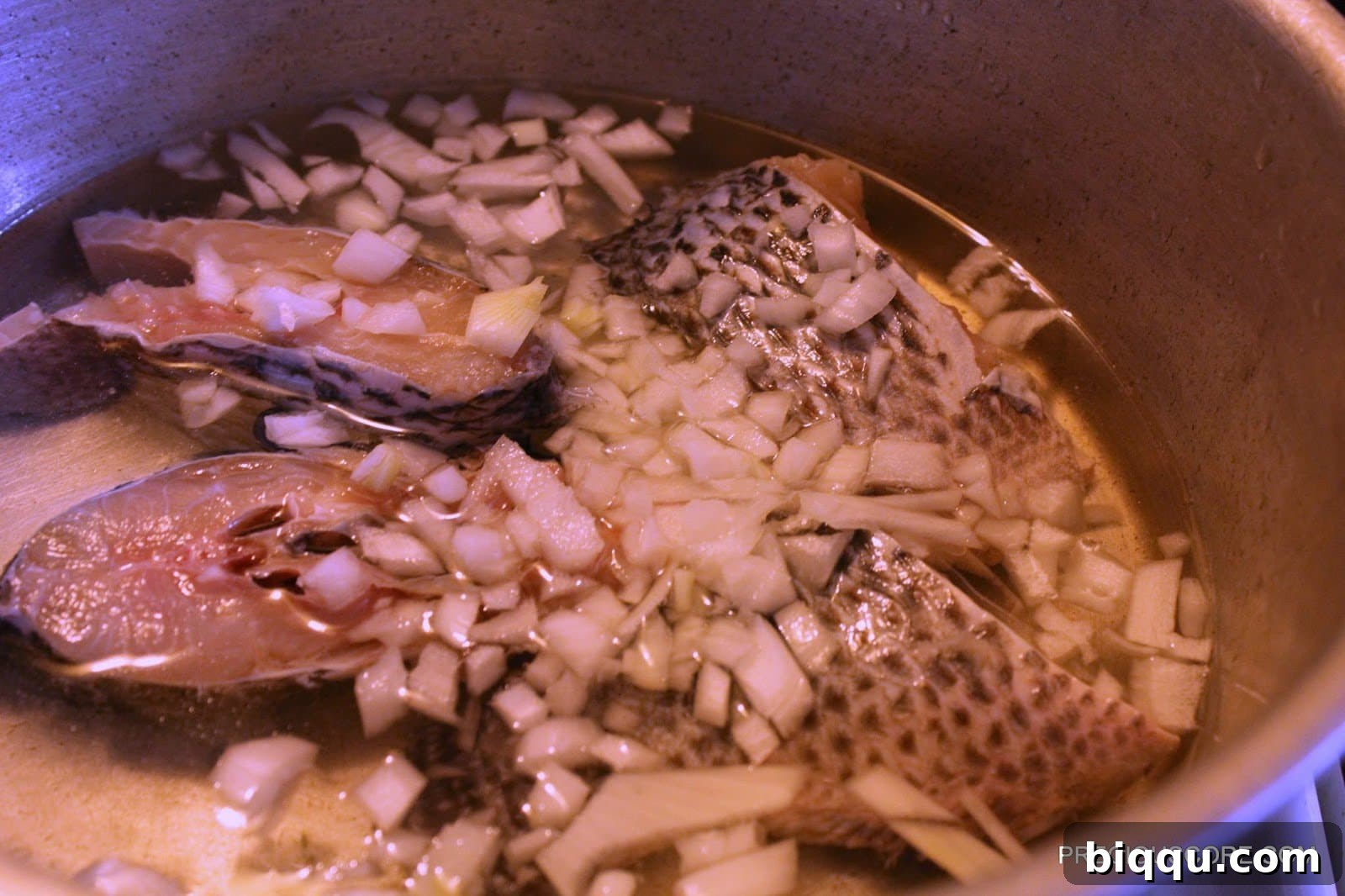 Tilapia and Onions in Pot