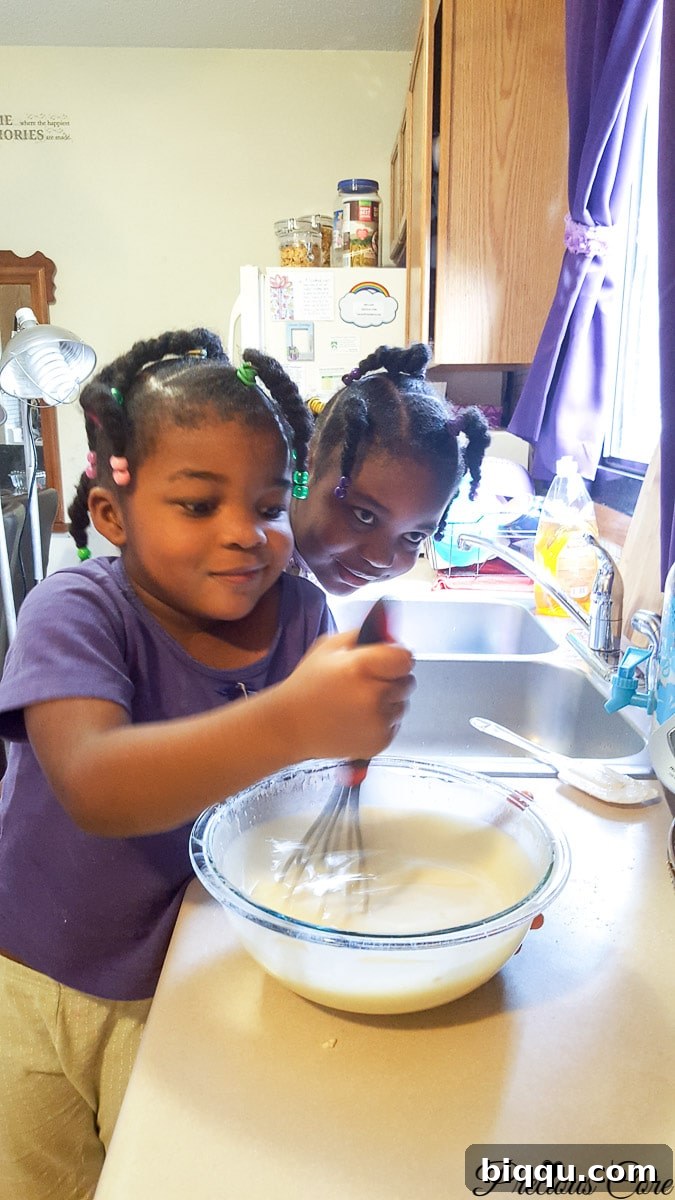 Our Inaugural Homeschool Adventure 8 Mother and daughters happily cooking together in the kitchen, a cherished part of their homeschooling journey.