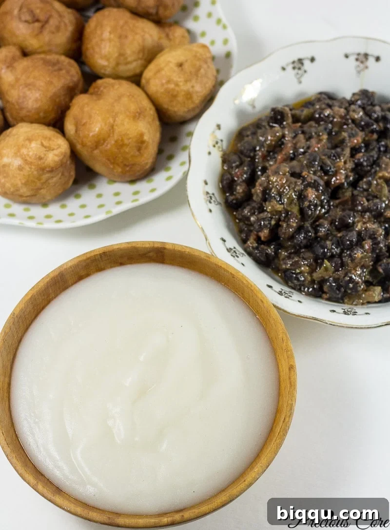 How to make pap from scratch! Pap is a corn porridge typically eaten in Cameroon and Nigeria. Instead of using whole corn as is traditionally used, I used corn flour in this recipe and the results are epic. It is authentic, slightly tangy and so comforting. I love having this for breakfast or a quick dinner.