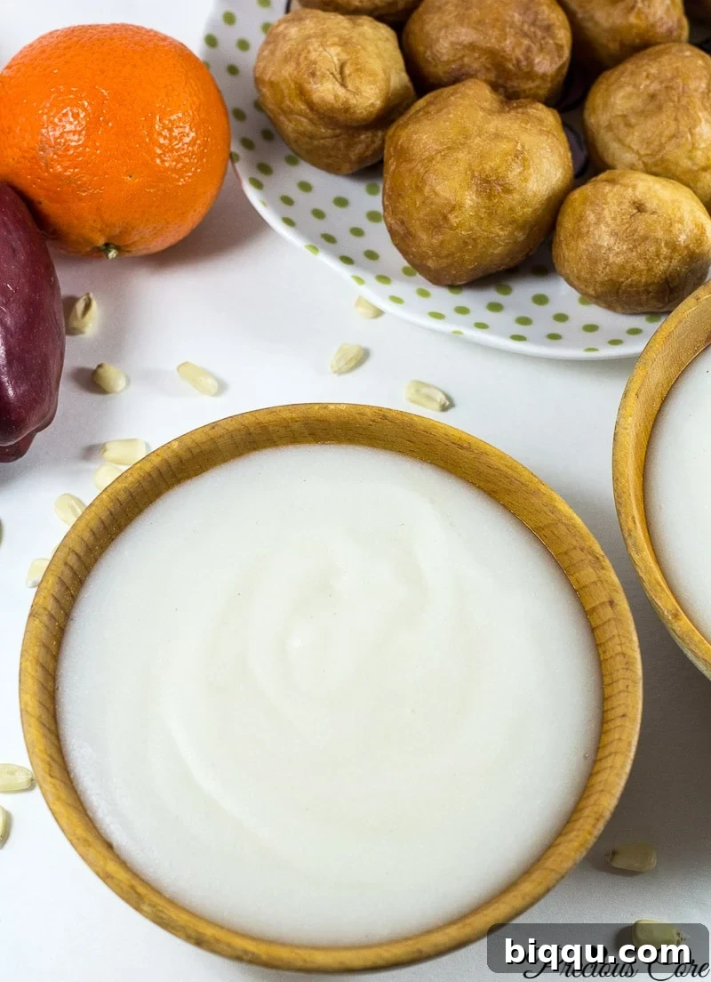 How to make pap from scratch! Pap is a corn porridge typically eaten in Cameroon and Nigeria. Instead of using whole corn as is traditionally used, I used corn flour in this recipe and the results are epic. It is authentic, slightly tangy and so comforting. I love having this for breakfast or a quick dinner.