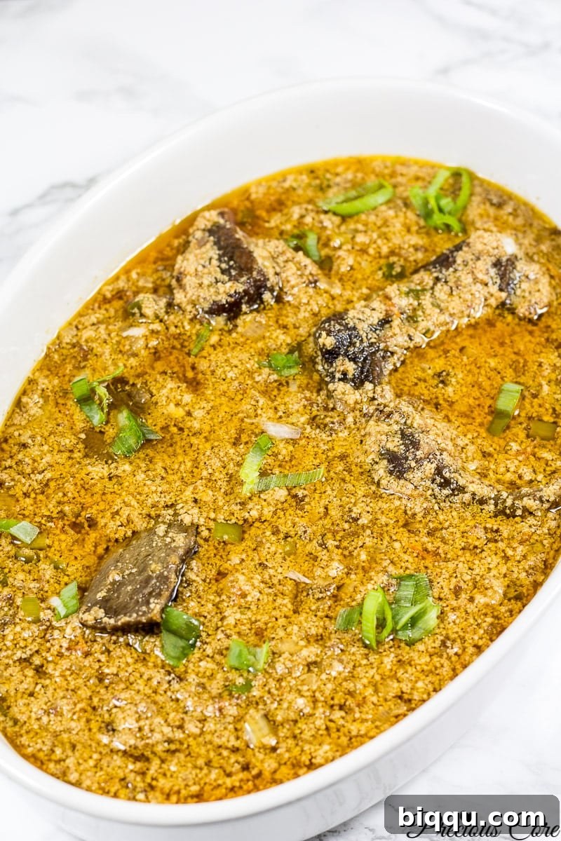 Authentic Egusi Stew 2 How to Make Egusi Stew - A close-up of the delicious stew in a pot