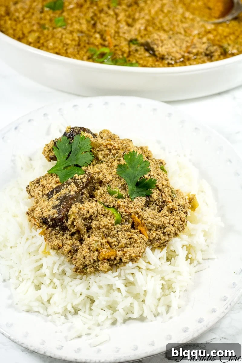 Authentic Egusi Stew 4 Egusi Stew served with boiled rice, a classic West African meal