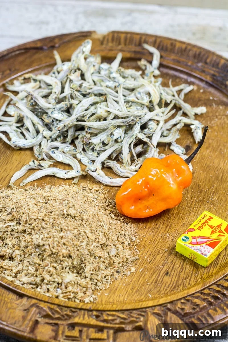 Ingredients for Cameroonian Mboh including peanuts, crayfish, and seasoning.